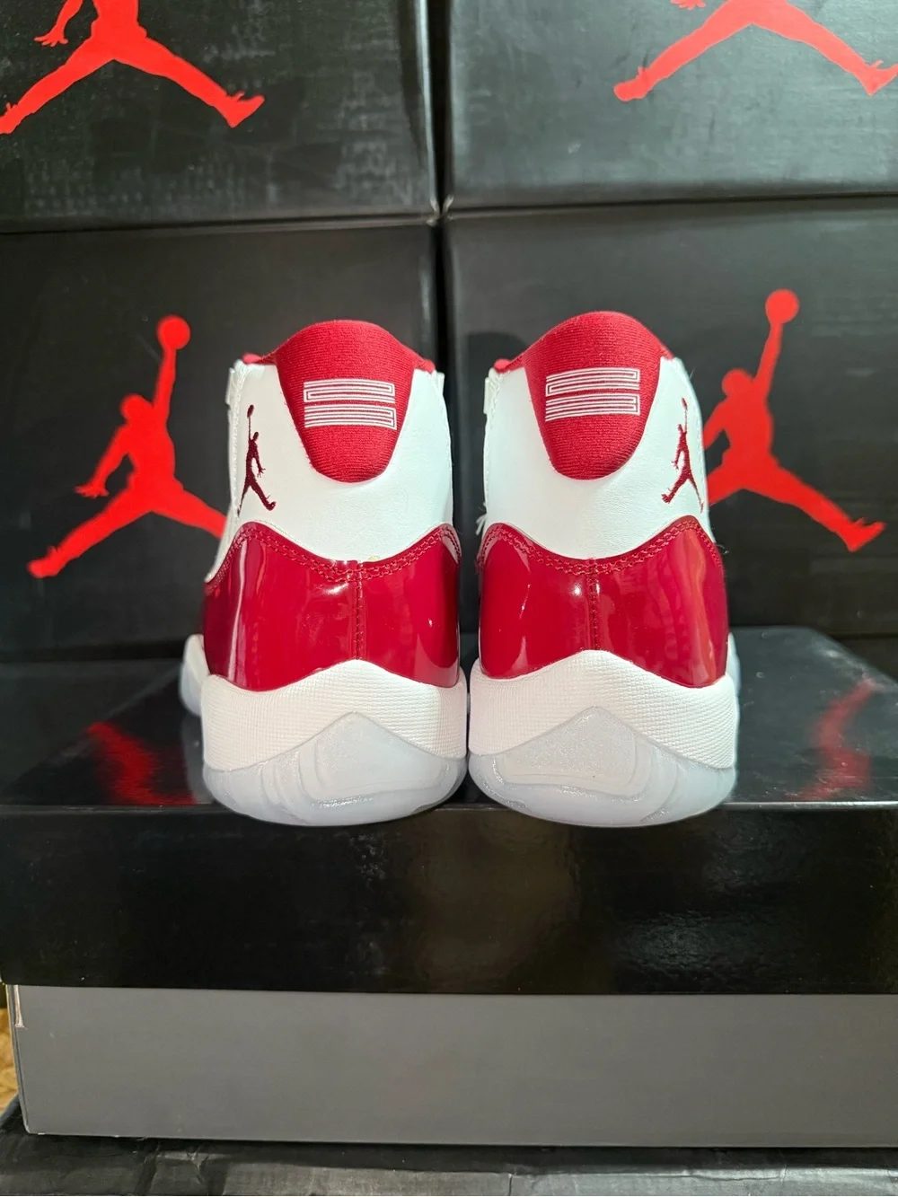Jordan 11 Retro Cherry Low-Top Sneaker in White & Red